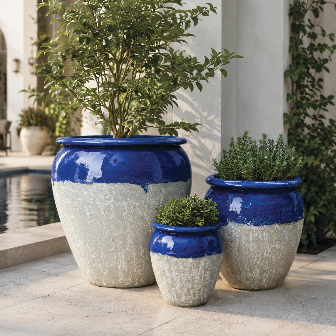Maricopa Water Jar in Blue over Greystone styled in an outdoor setting