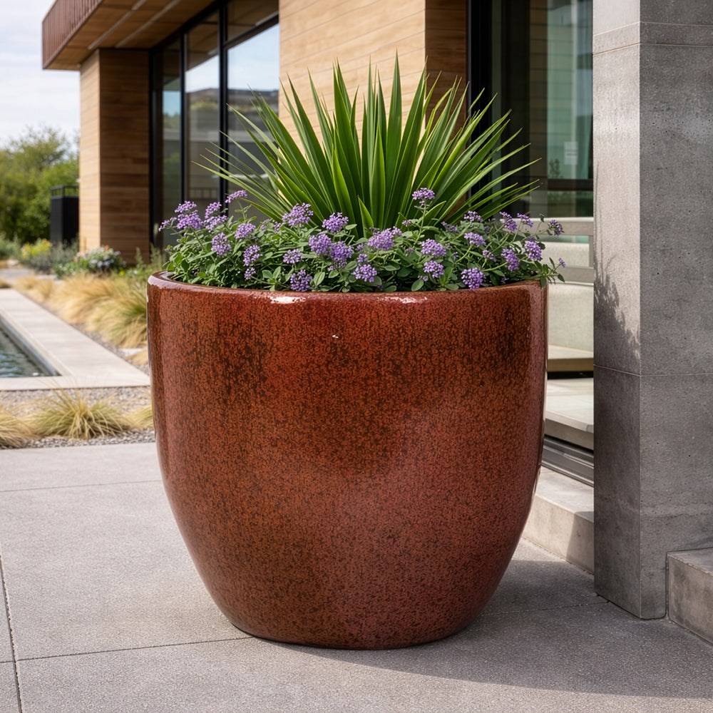 Egg Planter in Sunset styled in an outdoor setting
