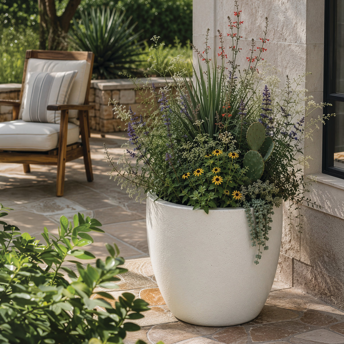 Egg Planter in Antique White styled in an outdoor setting