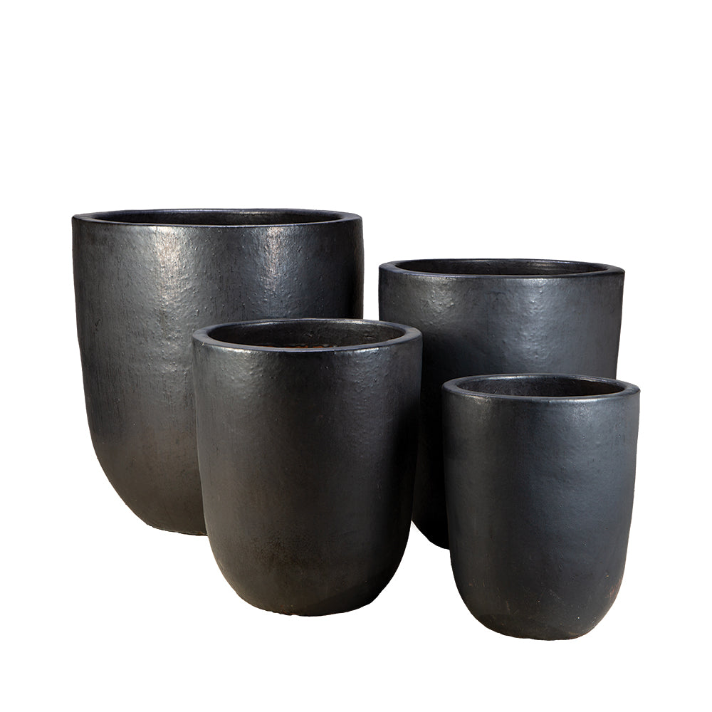 Tall Vestro Ceramic Round planters in 15", 20", 24", and 28" sizes on outdoor patio.